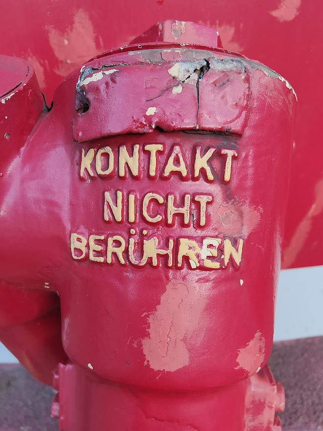 Bild mit Text "Kontakt nicht berühren"